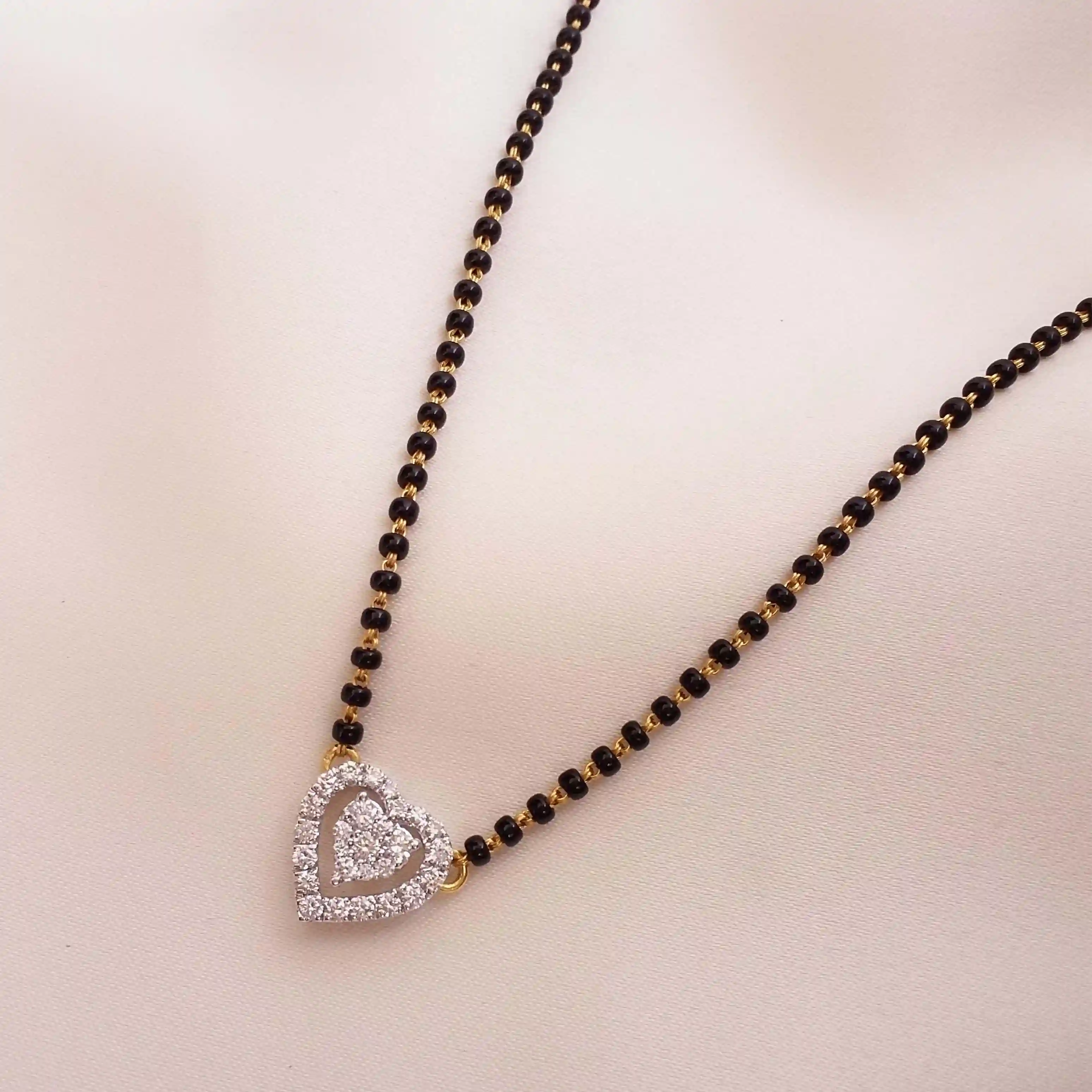 Buy Coeur Heart Diamond Mangalsutra 18 KT yellow gold (3.22 gm). | Online By Giriraj Jewellers