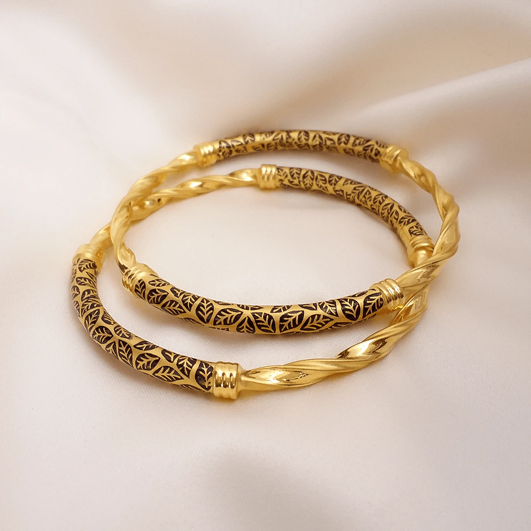 Buy Myra 22KT Twisted Gold Bangles 22 KT yellow gold (35.6 gm). | Online By Giriraj Jewellers