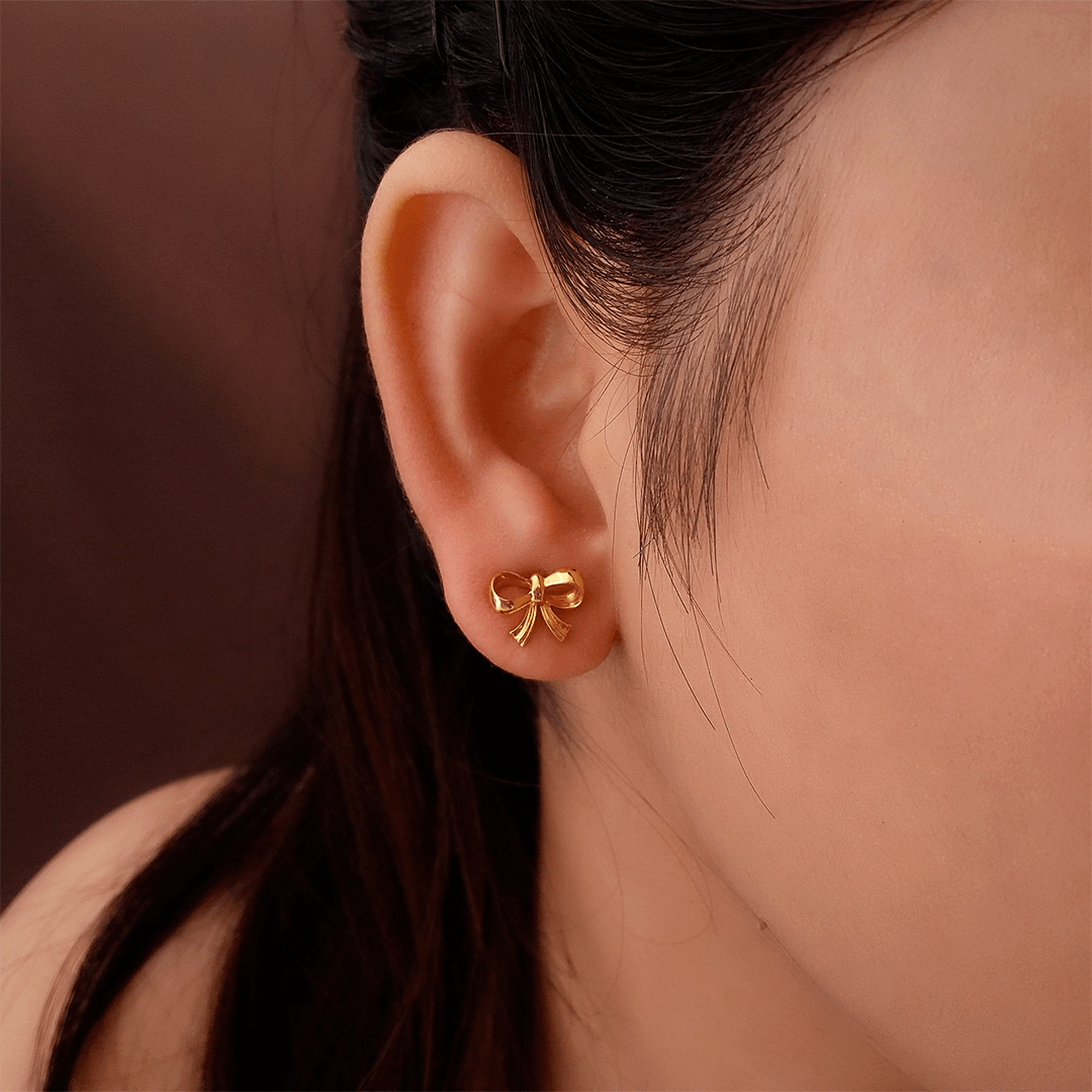 Buy Mira Bow Gold Earrings 22 KT yellow gold (2.78 gm). | Online By Giriraj Jewellers