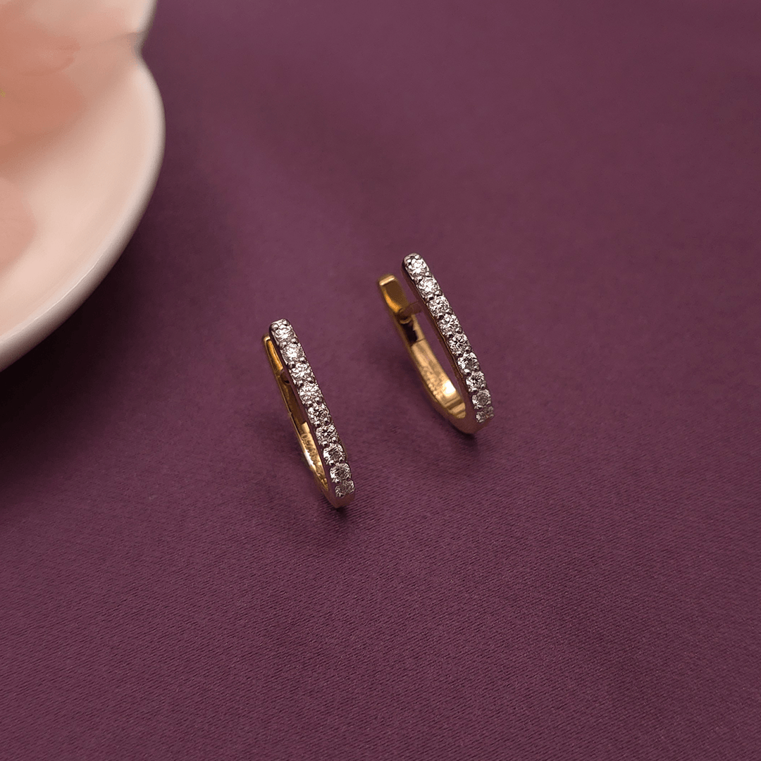 Buy Blazing Desire Diamond Hoop Earrings 18 KT yellow gold (2.71 gm). At Best Price In India. Check Earrings New Designs At Giriraj Jewellers. BIS Care, Hallmark, 100% Certified | Trust & Quality of Giriraj Jewellers India | Diamond hoop earrings for daily wear, elegance, sophistication, simple, sophisticated, girls, women, jewelry collection, 18kt gold, VVS VS FG certified diamonds, everyday look.