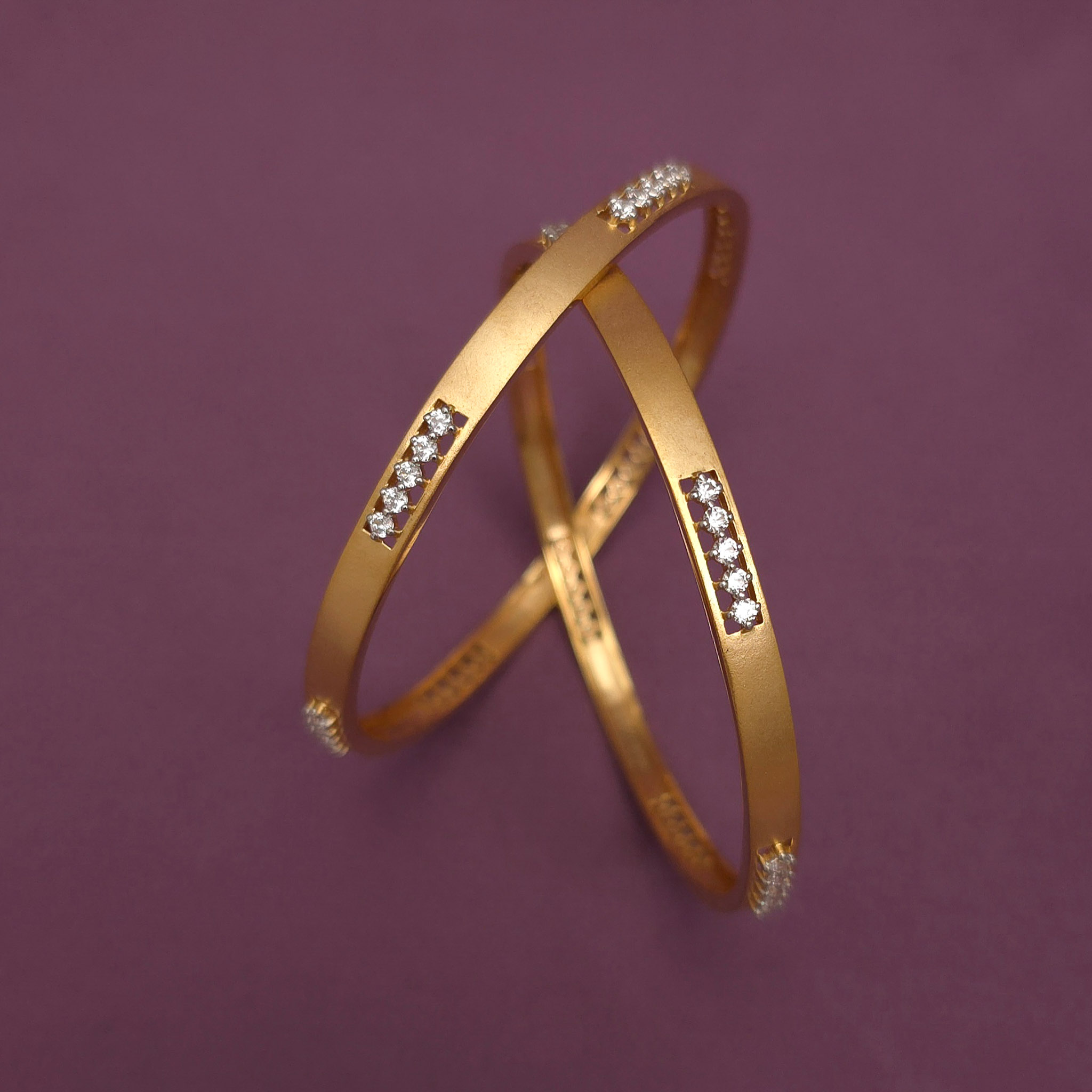 Buy Kelly Dazzle Diamond Bangles 18 KT yellow gold (32.5 gm). | Online By Giriraj Jewellers