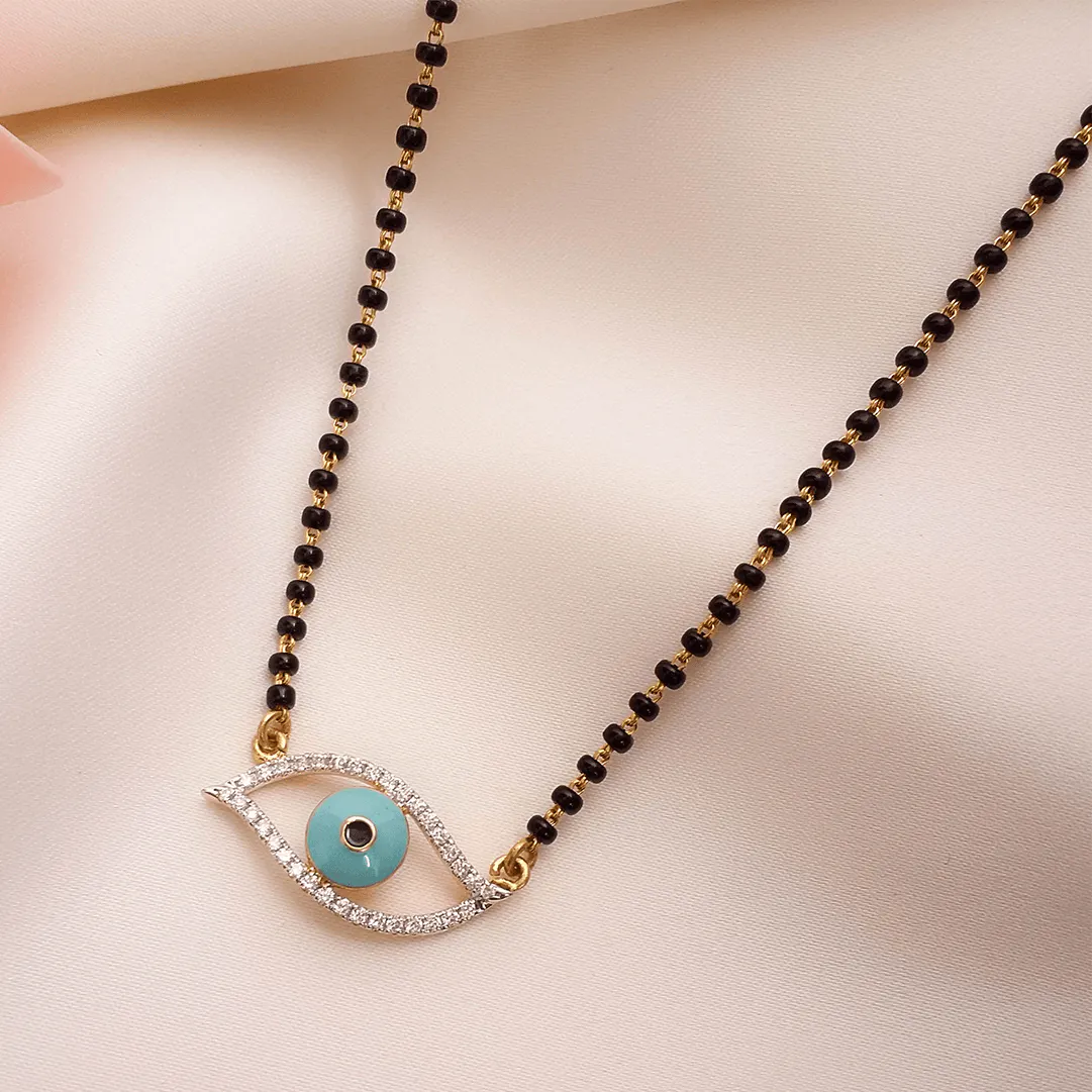 Buy Aqua Eye Diamond Mangalsutra 18 KT yellow gold (7.14 gm). | Online By Giriraj Jewellers