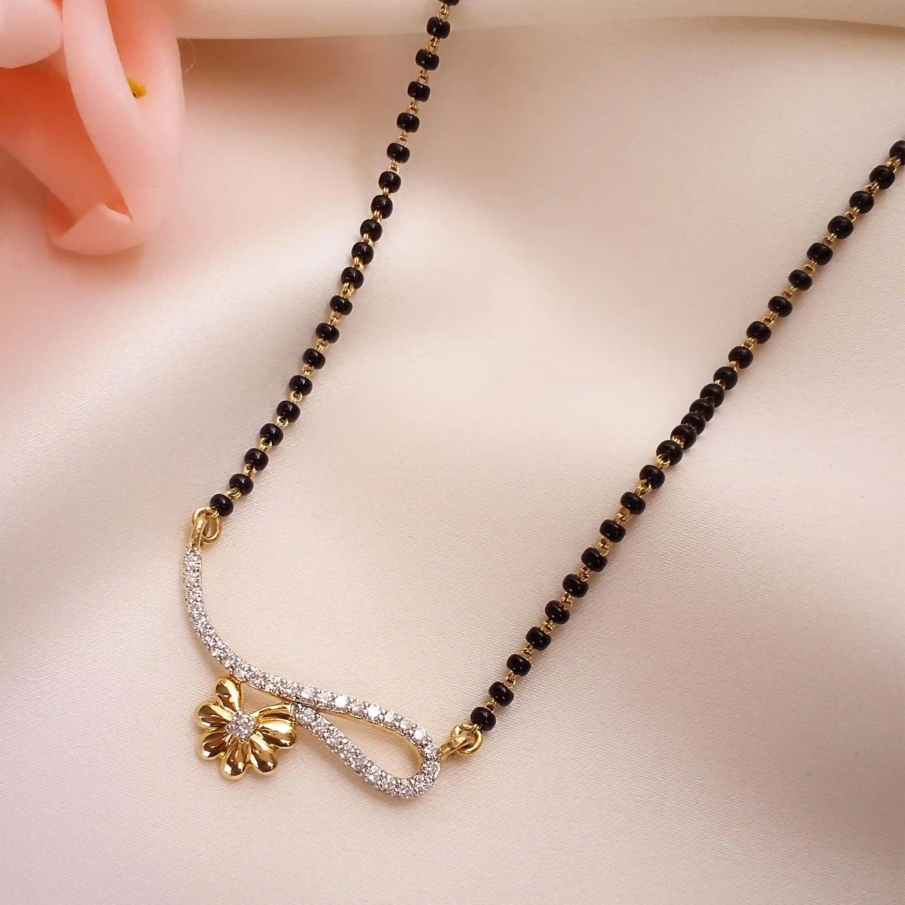 Buy Heavenly Hues Diamond Mangalsutra 18 KT yellow gold (4.602 gm). | Online By Giriraj Jewellers