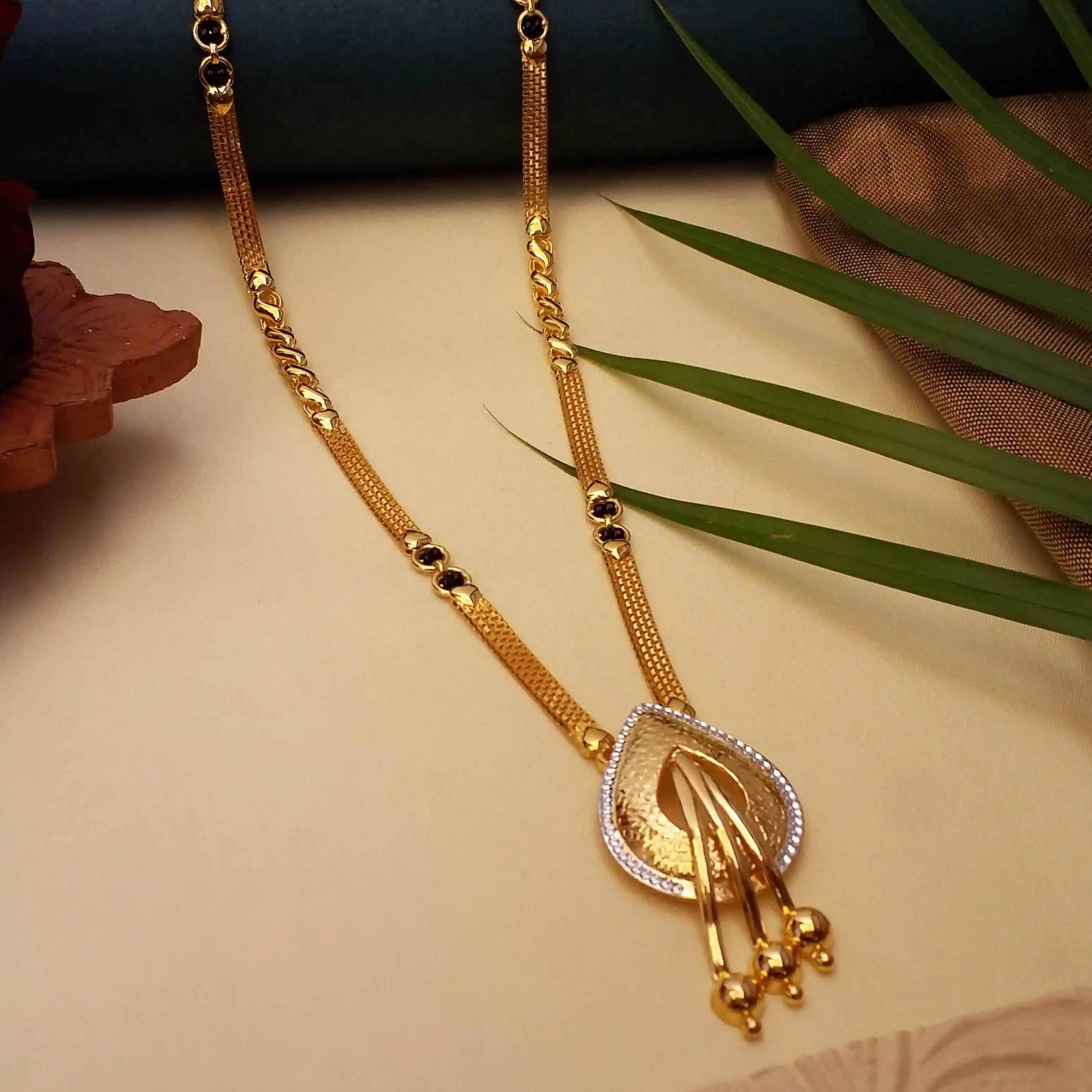 Buy Spiritual Gold Mangalsutra 22 KT yellow gold (17.5 gm). | Online By Giriraj Jewellers