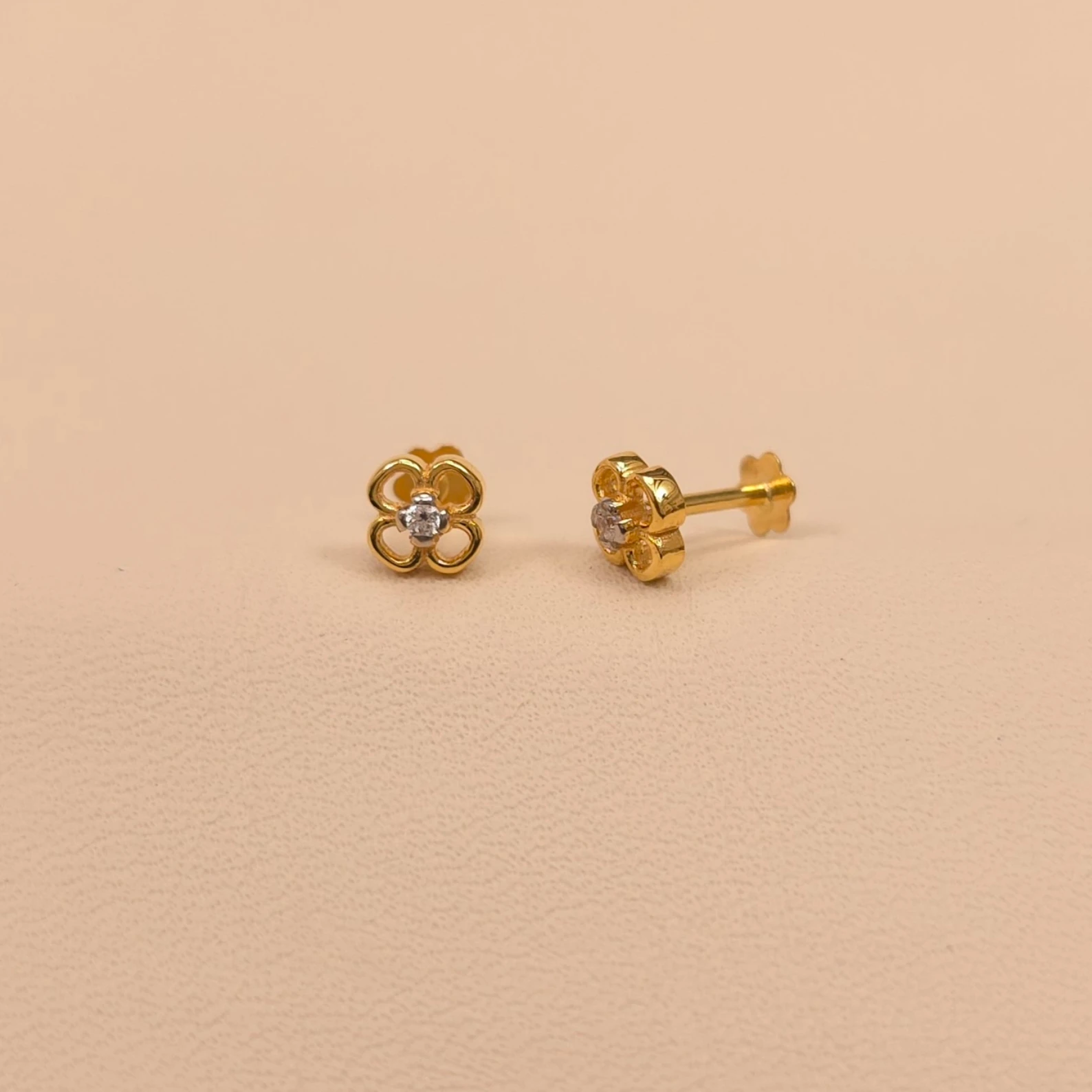 Buy SparkCurl Mini Gold Studs 18 KT yellow gold (0.728 gm). | Online By Giriraj Jewellers