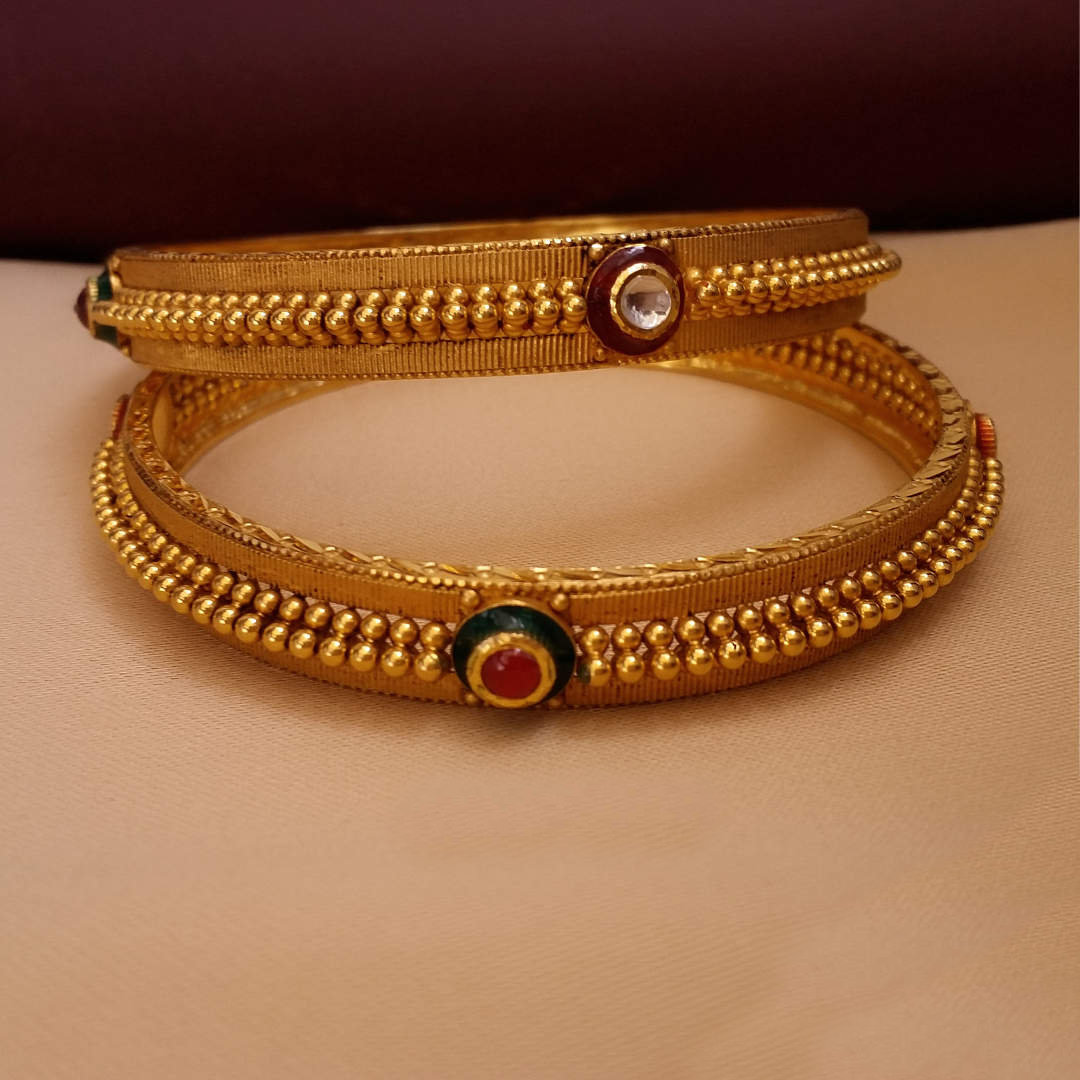 Buy Meira Motif 22KT Gold Bangles 22 KT yellow gold (40.5 gm). | Online By Giriraj Jewellers