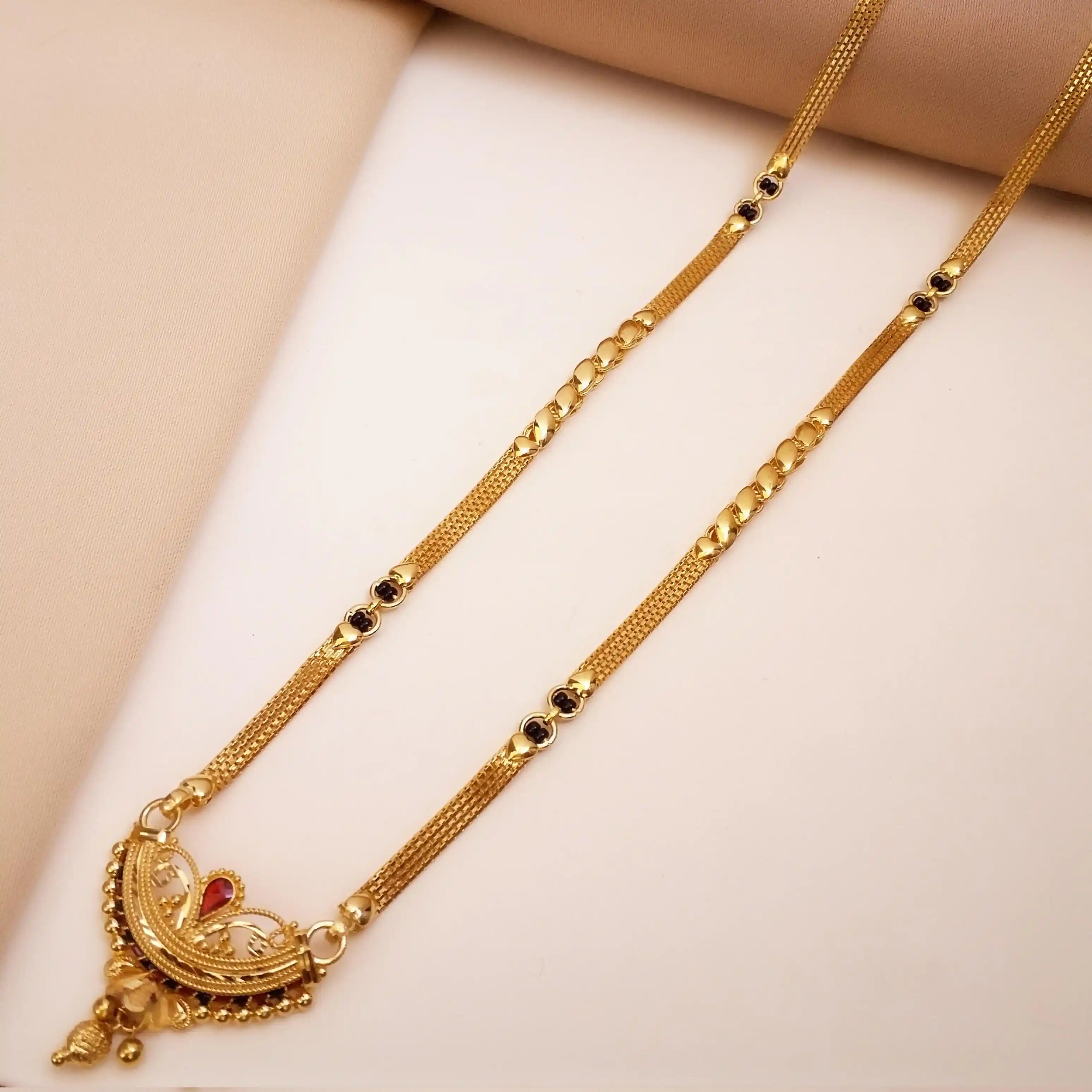 Buy Fairy-tale Gold Mangalsutra 22 KT yellow gold (18.01 gm). | Online By Giriraj Jewellers