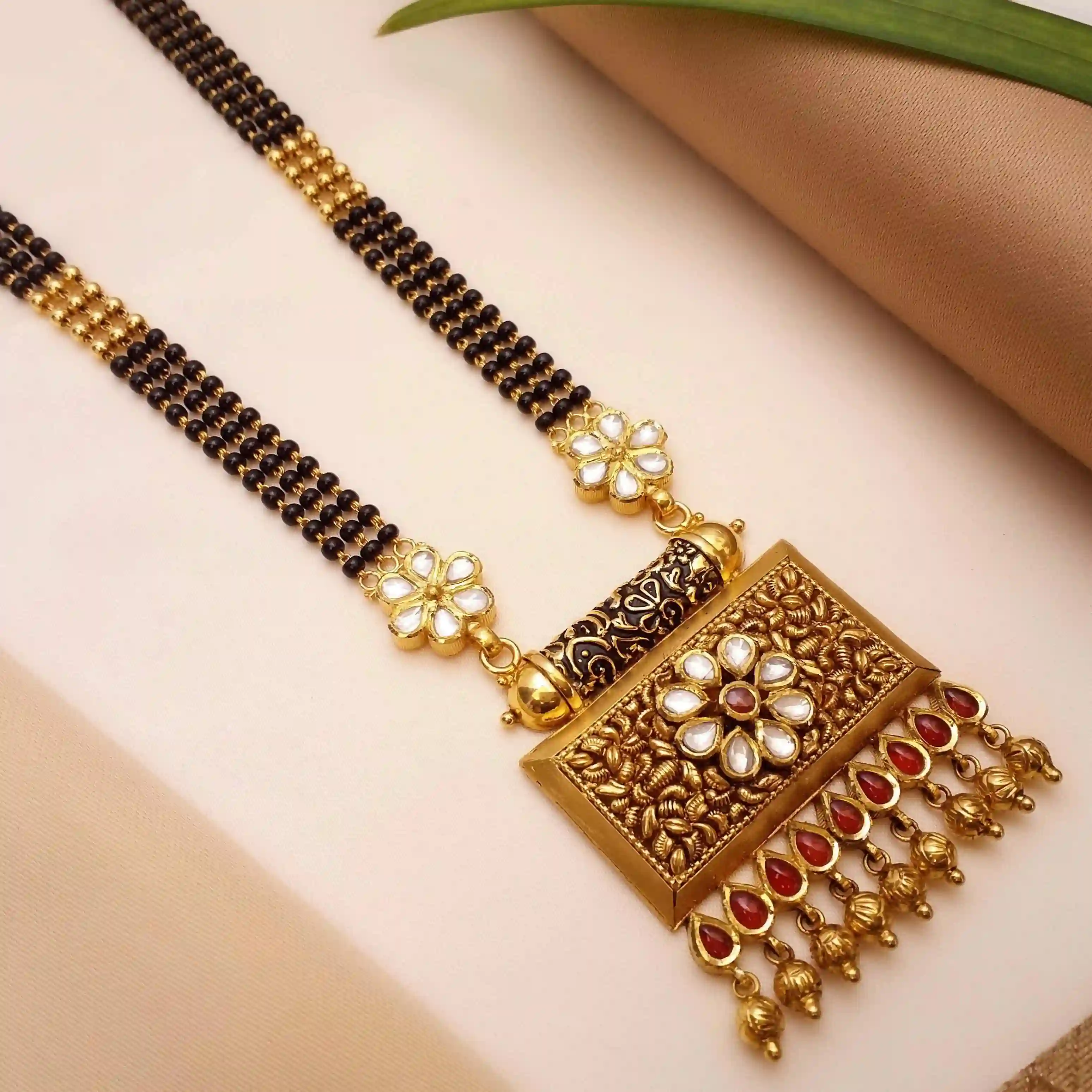 Buy Elements Gold Mangalsutra 22 KT yellow gold (32.7 gm). | Online By Giriraj Jewellers
