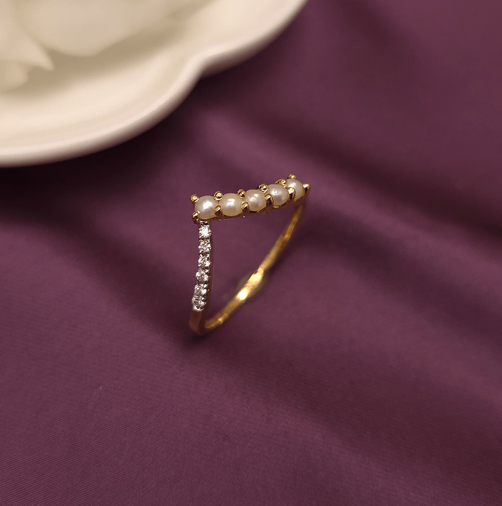 Buy Willow Pearl Diamond Ring 18 KT yellow gold (1.718 gm). At Best Price In India. Check Rings New Designs At Giriraj Jewellers. BIS Care, Hallmark, 100% Certified | Trust & Quality of Giriraj Jewellers India | best gemstone ring store | buy gemstone rings online | casual gemstone rings | beautiful gemstone jewellery | high quality gemstone jewellery designs | certified gemstone ring benefits | gemstone ring price | comfortable gemstone rings for women | original gemstone rings | rings with stones designs