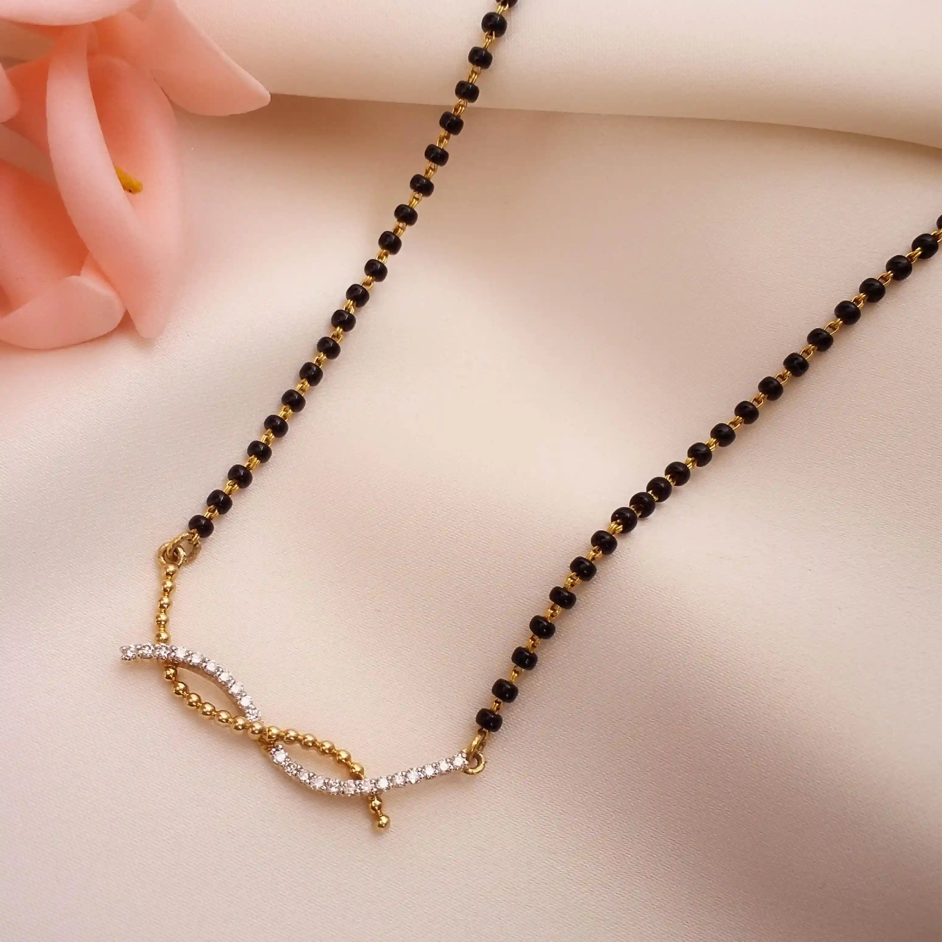 Buy Gathbandhan Diamond Mangalsutra 18 KT yellow gold (4.074 gm). | Online By Giriraj Jewellers