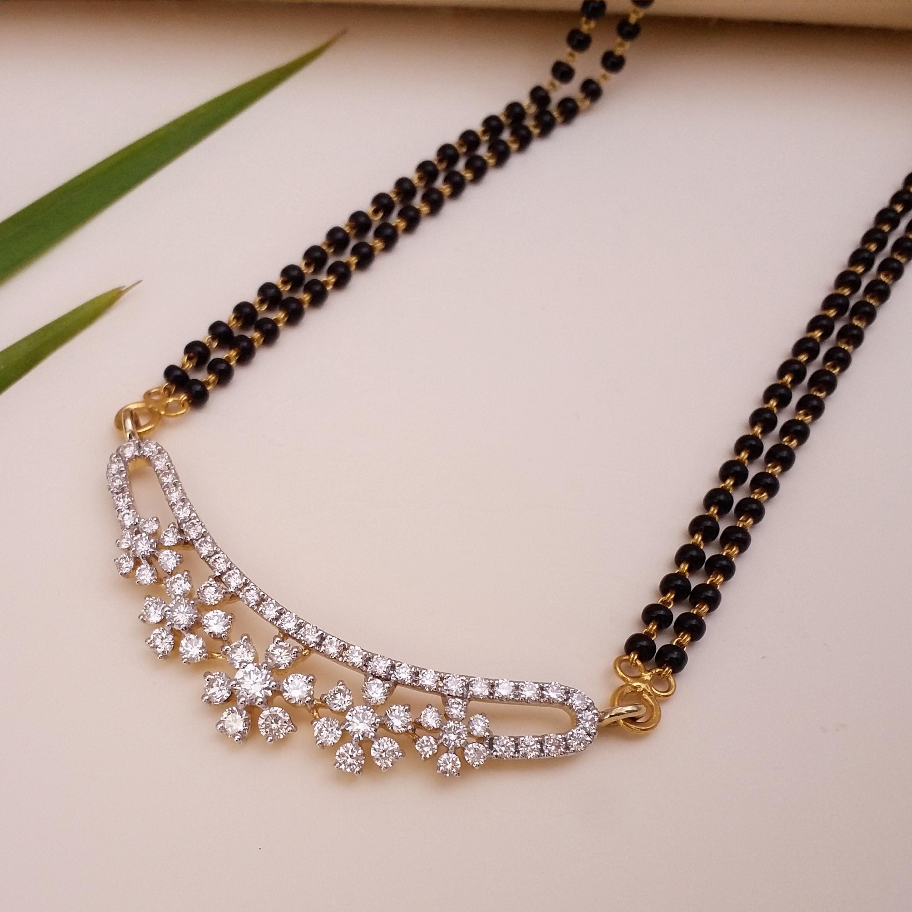 Buy Urbana Diamond Mangalsutra 18 KT yellow gold (12.61 gm). | Online By Giriraj Jewellers