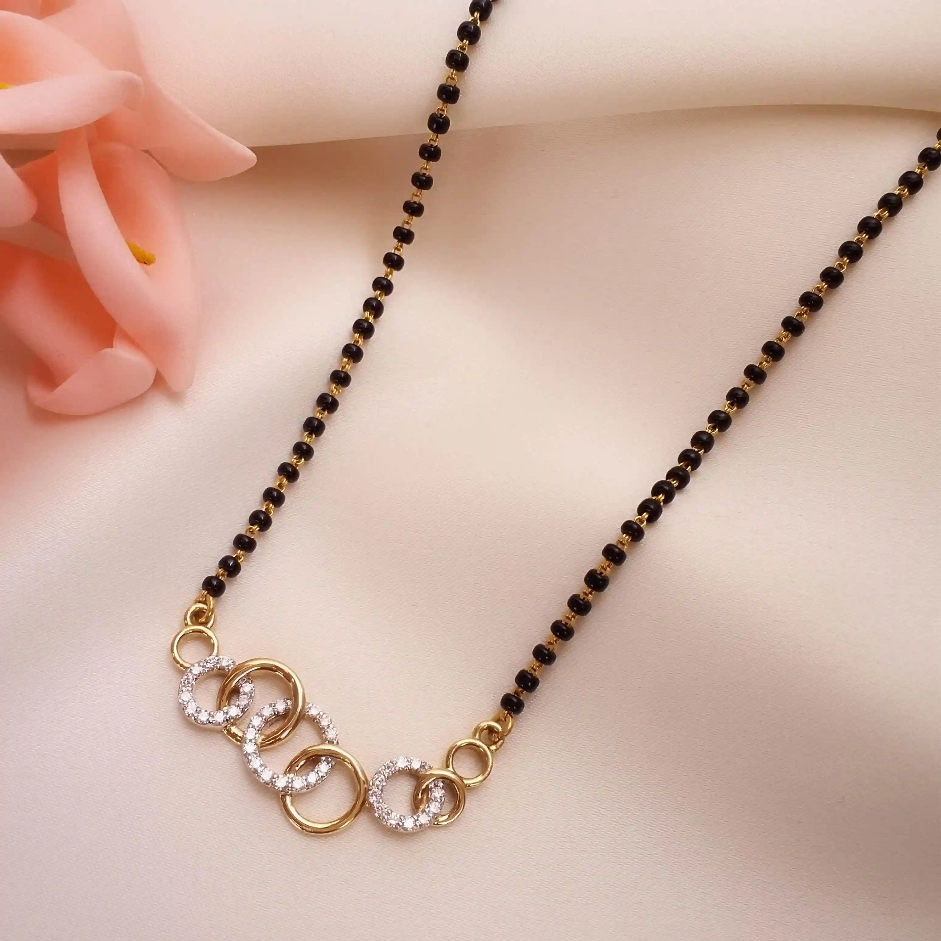 Buy Pure Devotion Diamond Mangalsutra 18 KT yellow gold (5.85 gm). | Online By Giriraj Jewellers