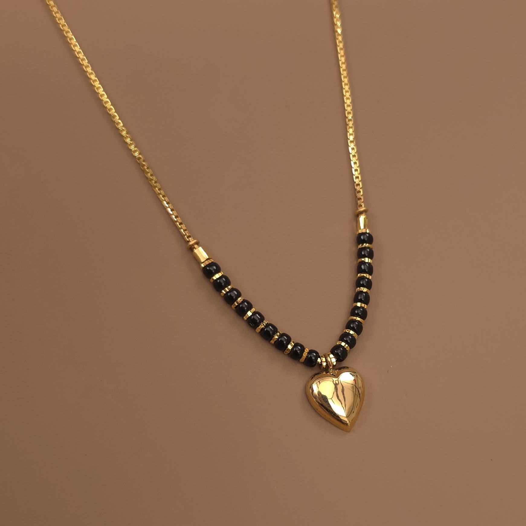 Buy Aponi Heart Gold Mangalsutra 22 KT yellow gold (6.1 gm). | Online By Giriraj Jewellers