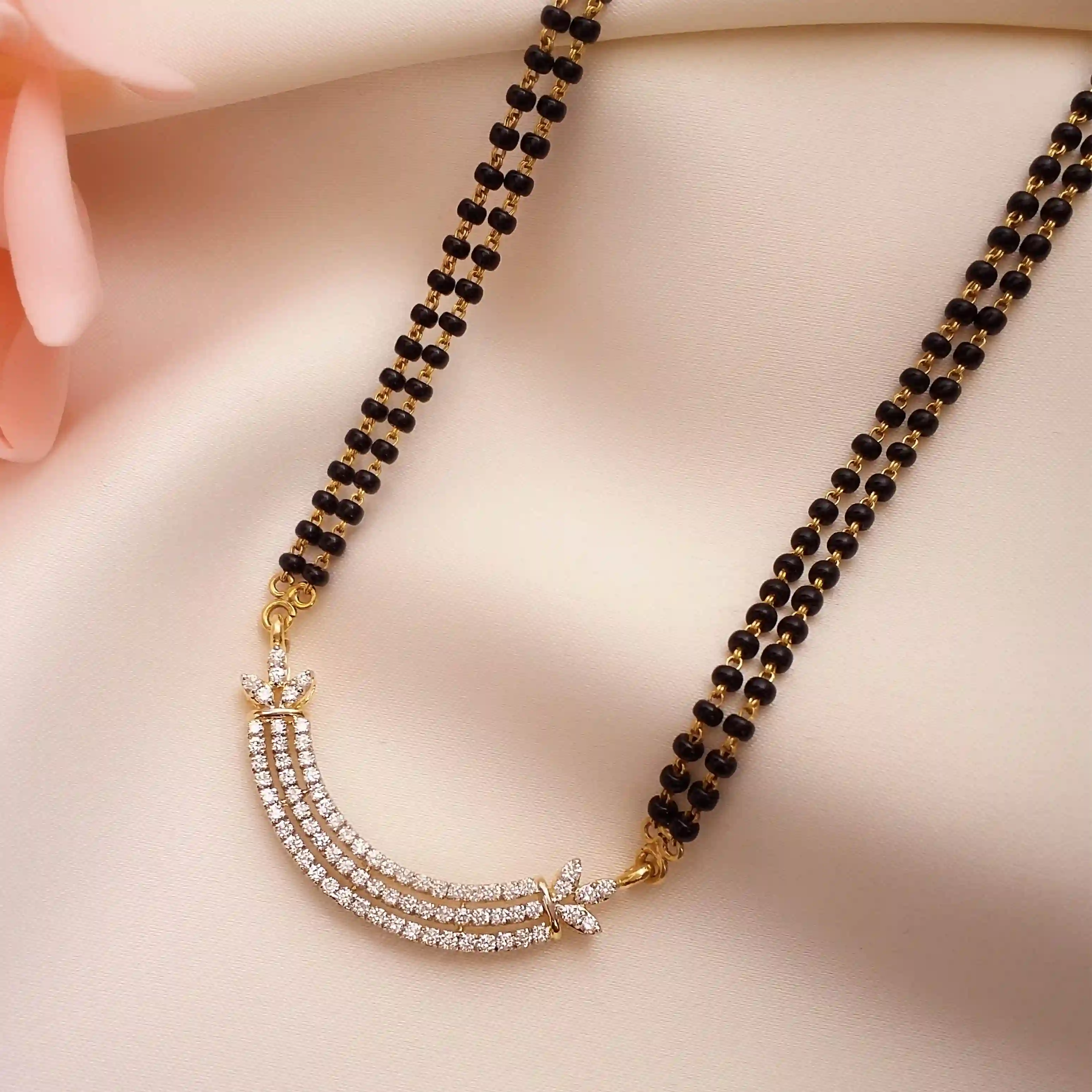 Buy Eloquence Diamond Mangalsutra 18 KT yellow gold (4.412 gm). | Online By Giriraj Jewellers